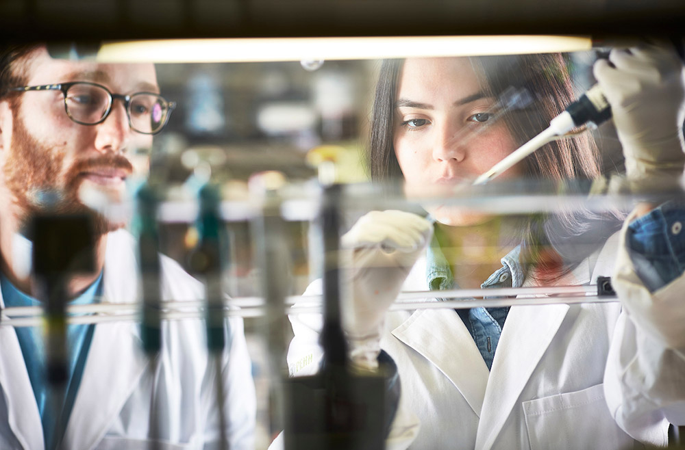 Proton Researchers in Lab